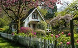 Fototapeta Natura - Home with a White Picket Fence Delight