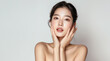 © A_visual - Beautiful young Asian woman, white, smooth, clean face. Studio atmosphere, advertising concept for cosmetics, spa, beauty clinic, Generative AI
