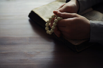 Wall Mural - Reading religious literature. Open book. Man reads bible or Koran.