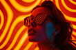 A mysterious woman with a face hidden behind sunglasses stands confidently against a vibrant neon light, a stunning fusion of human and artistic expression