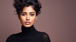 © BlazingDesigns - Portrait of beautiful gorgeous indian woman model in turtleneck sweater posing against colourful blank copy space wall for your content.