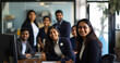 © Graphic Master - Indian corporate staff in a modern workspace