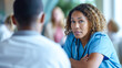 © Graphic Master - Portrait of a caring nurse comforting a worried family member in a hospital waiting area