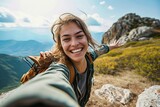 Fototapeta Londyn - Young woman taking selfie portrait hiking mountains - Happy hiker on the top of the cliff smiling at camera - Travel and hobby concept, Generative AI