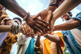 Fototapeta Londyn - Multi ethnic group of young people holding hands outdoors - Community life style concept with guys and girls hugging together outside - Unity, support, Generative AI