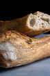 Close up shot of two baguettes of french bread highlighting the crust and texture.