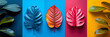 Colorful tropical leaves arranged in a symmetrical pattern on contrasting monochromatic backgrounds, suitable for design themes or creative concepts