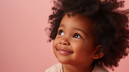 Wall Mural - A cute little one joyfully poses against a pastel backdrop.