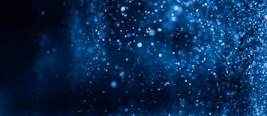 Wall Mural - abstract blue bokeh defocus glitter blur background.