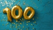 Gold Balloons and Streamers With the Number 100 - Celebrating a Milestone