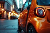 Fototapeta  - A compact, fuel-efficient orange Smart car parked on a bustling city street. Perfect for automotive or urban lifestyle themes
