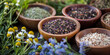 Assortment of dry tea in wooden bowls, medicinal herbs with chamomile