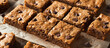 homemade blondies with chocolate chips cut into squares.