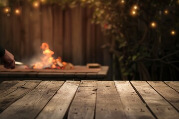 Wall Mural - empty wood canvas, out of focus image of a person lighting a bbq fire