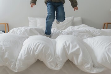 Wall Mural - kid jumping on a bed with plush goosedown duvet