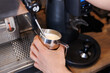 © Studio Peace - Close-up of espresso pouring from coffee machine. Professional coffee brewing.