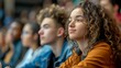 © Tatsiana - A vibrant university lecture hall with students of various ethnicities engaging in learning. Accessibility, diversity, and equality in education. AI Generated
