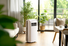 Portable Air Conditioner In Stylish Interior Living Space With Plants. Save Energy And Electricity Concept