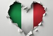 Heart shaped hole torn through paper showing satin texture of flag of Italy Isolated on white backgr