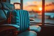  A forgotten small suitcase is sitting on a leather chair at the airport at sunset. the concept of travel, tourism, recreation. copy space