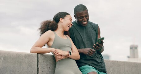 Canvas Print - Happy, couple and laugh at phone outdoor for exercise with social media, communication and relax on break. Fitness, meme and people with funny post about workout or watch a video together in city