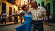 © Paula - Energetic Cuban couple dancing salsa on a street in Cuba