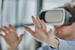 © Katsiaryna - businessman in virtual reality headset in the office