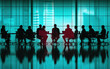 © kiatipol - business people sitting at a table during a meeting large screen, in the style of silhouette.