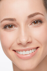 Poster - Skincare, closeup and happy woman with beauty from dermatology or headshot for cosmetics. Girl, smile and portrait with perfect teeth and skin from healthy care and treatment with model in studio