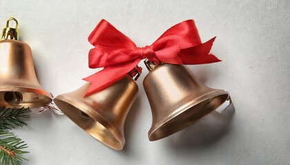 Wall Mural - christmas bells with red bow on white background