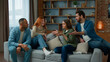 © Yuliia - Group of diverse ethnic multiracial friends girls guys sit on sofa at home talking argue conflict friendly dispute debate discussing problem ambitious expressive men women arguing discussion indoors
