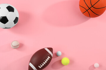 Poster - Many different sports balls on pink background, flat lay. Space for text