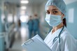© Лена Шевчук - Doctor in a cap and mask holding a folder in her hand against the background of a hospital room