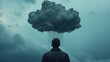 Having a black cloud hanging over your head- raining cloud over man - concept for depression