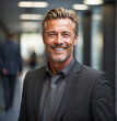 © PSCREATIVE - Photo of middle aged man in business attire