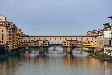 Canvas Print - The Ponte Vecchio, a medieval stone closed-spandrel segmental arch bridge over the Arno, in Florence, Italy