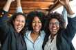 Three women celebrating professional success in the office, teamwork, work friends.