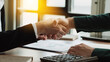 businessman making handshake to success deal to be partnership. Two business men agreement company trade partnership handshake, dealing, merger and acquisition, business partner joint venture concept.