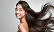 © A_visual - Portrait of a beautiful woman with a bright smile, hair is a beautiful black color, shampoo advertising concept Hair conditioner and cosmetic products,Generative AI