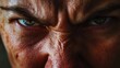 Close-Up Shot of an Angry Man’s Face with Furrowed Brows Expressing Intense Anger