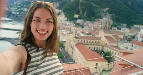 Wall Mural - Vlog, woman and balcony with happiness for town view, scenery and holiday for adventure in Italy. Influencer, vacation and travel with excitement for sightseeing trip, tour and create memories.