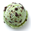 A scoop of mint chocolate chip ice cream, with rich green color and dark chocolate chips