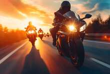Group Of Super Sport Motorcycle Riders Riding Together At Sunset