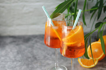 Wall Mural - Glasses with aperol spritz cocktail	