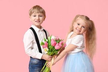 Sticker - Cute little children with bouquet of beautiful tulips on pink background. International Women's Day