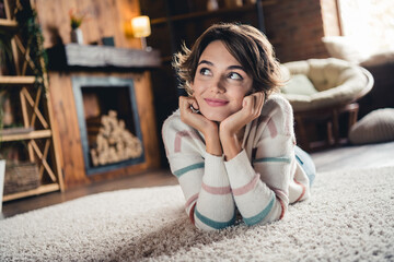 Sticker - Full body photo of peaceful pretty lady lying floor hands touch cheekbones look away imagine pastime apartment indoors