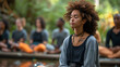 A mindfulness retreat, with focused individuals as the background, during a meditation practice