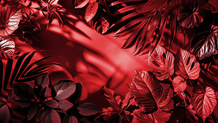 Sticker - A monochromatic image of tropical leaves in various shades of red with soft shadows on a matching background top view