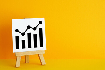 Poster - Up arrow chart on the easel. Success, growth and performance improvement. Statistics and business analytics. High efficiency and productivity. Income revenue statement analysis