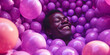 smiling African man rolls in purple balls. pop Art